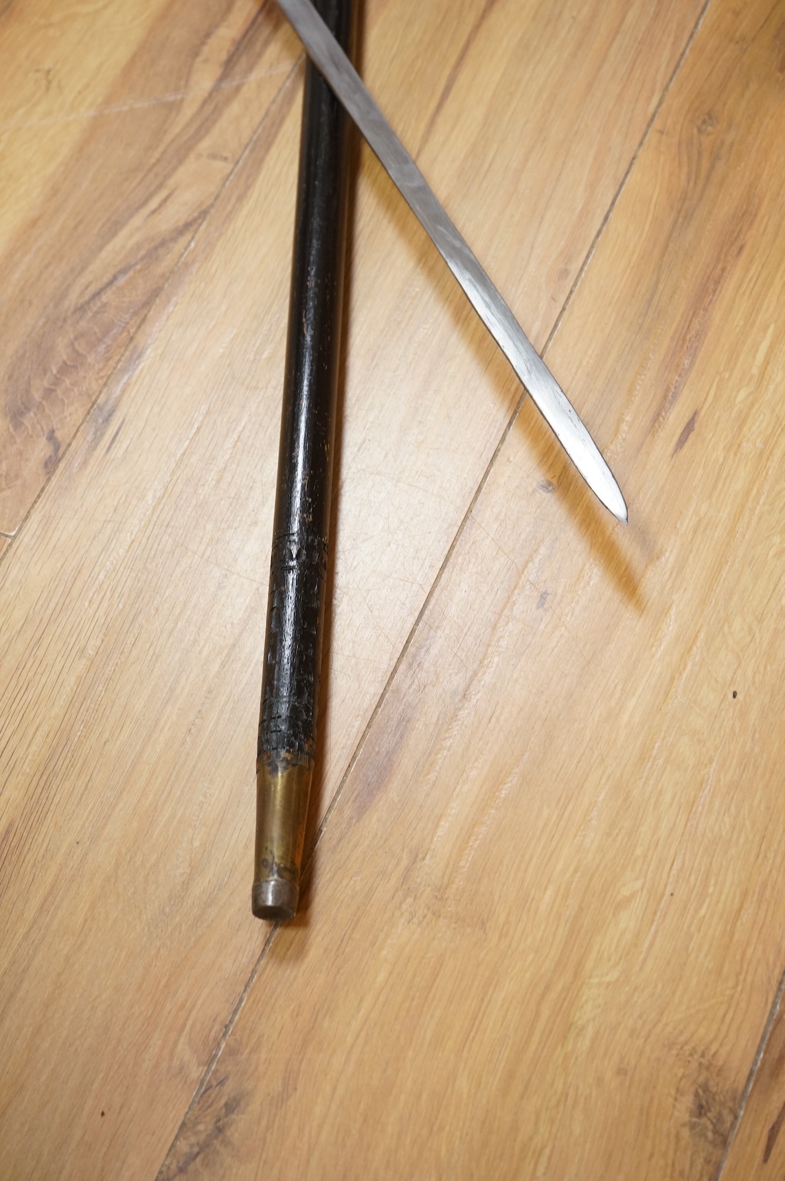 An early 20th century Indonesian sword stick with bone inlay, 92cm in length